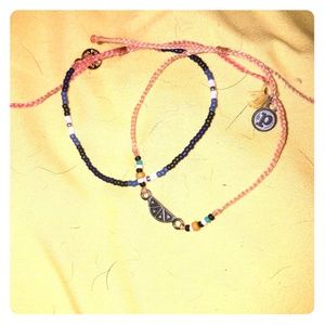 Navy seabead new release, with peach citrus charm